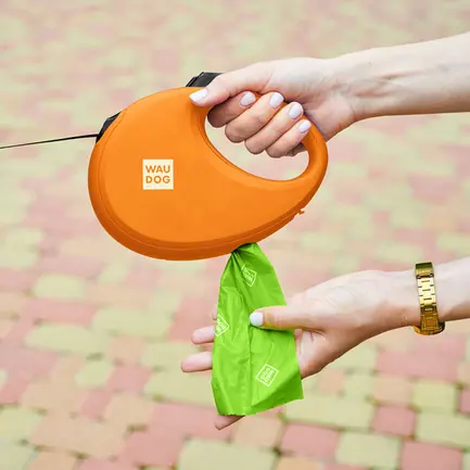 Повідець-рулетка для собак WAUDOG R-leash з контейнером для пакетів, світловідбивна стрічка, L, до 40 кг, 5 м, помаранчевий: додаткове фото 5