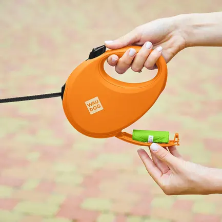 Повідець-рулетка для собак WAUDOG R-leash з контейнером для пакетів, світловідбивна стрічка, L, до 40 кг, 5 м, помаранчевий: додаткове фото 4